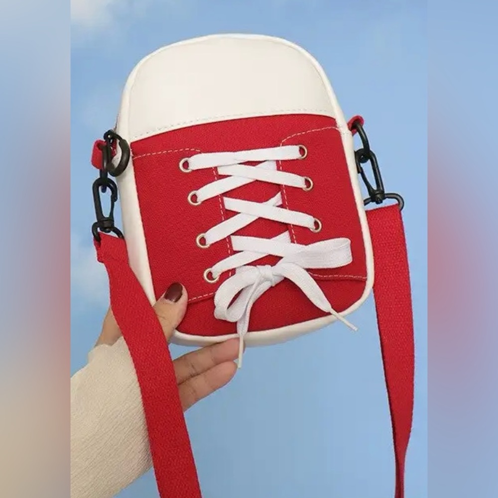 $3 SHOE PURSE. NEW. $3 WITH ANY $10 ORDER OR MORE